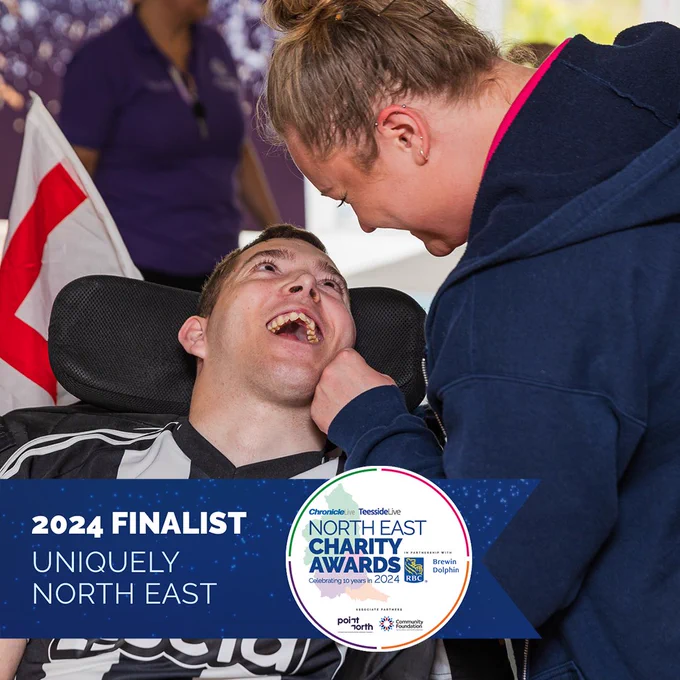 One of our young adults looking and smiling towards a staff member at St Oswald's Hospice.

We are delighted to be shortlisted for the 'Uniquely North East' Award from the 2024 North East Charity Awards.