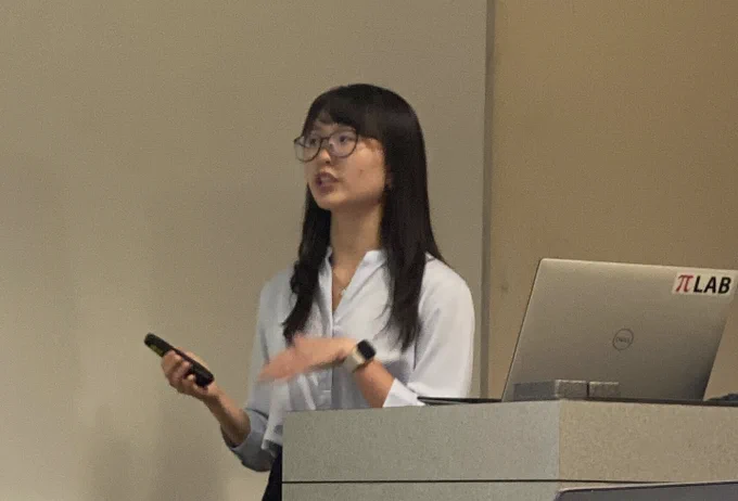 Faye presenting her thesis during her defense