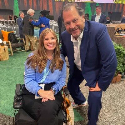 Brooke smiles with Marc Benioff.
