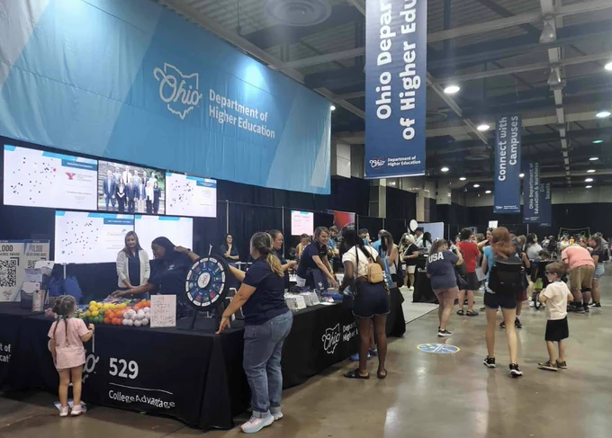 Ohio State Fair visitors at the Department of Higher Education booth. 