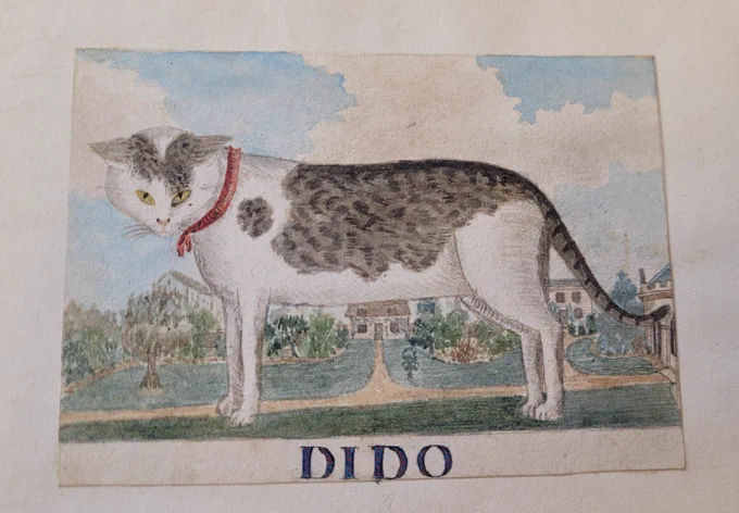 Watercolour of a tabby cat with houses and gardens in the background