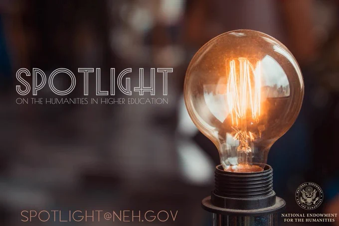 Image of an old-fashioned filament lightbulb glowing warmly against a blurred background in black and brown tones, overlaid with the words: “Spotlight on the Humanities in Higher Education” in art deco style fonts, with the NEH logo in the bottom right corner and the program email address (spotlight@neh.gov) in the bottom left corner. Photograph by Wilson Vitorino. 