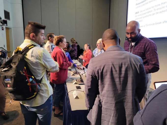Conference participants talking