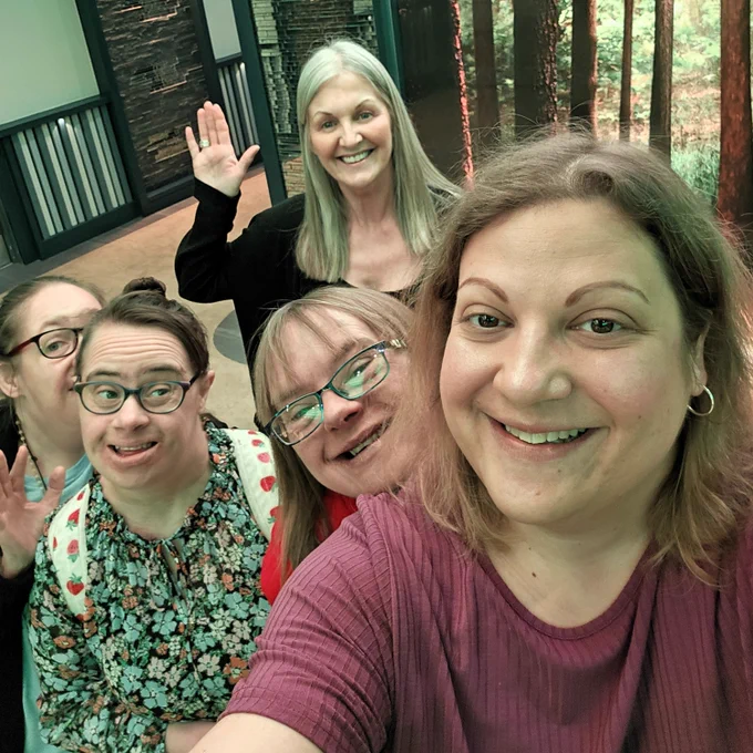 Emma, Sarah, Emma, Karen and Vicky grabbing a smiley selfie.