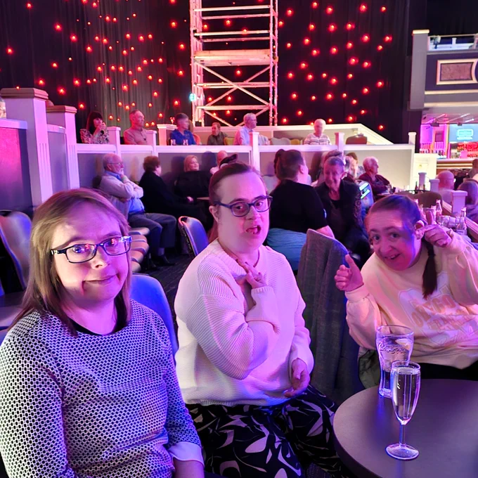 Emma, Sarah and Emma under the disco lights, enjoying the evenings entertainment. 