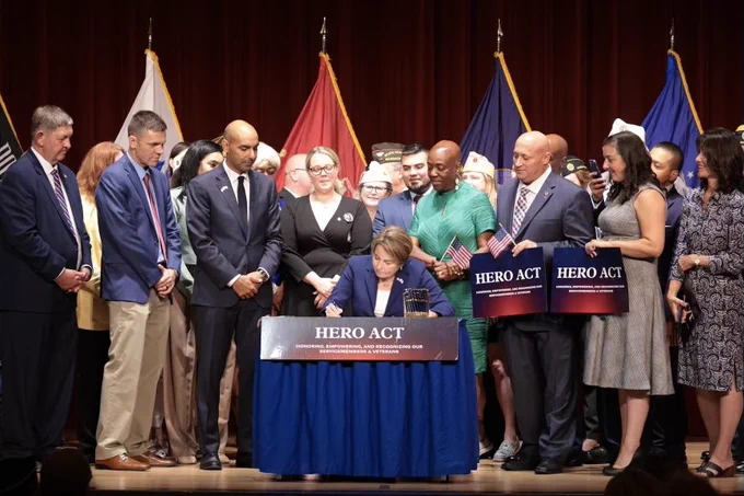 Governor Healey signing HERO Act.