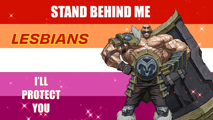 Against a backdrop of the Lesbian Pride flag, Braum poses powerfully with his arms akimbo. Text in the image reads “Stand behind me lesbians. I’ll protect you.”