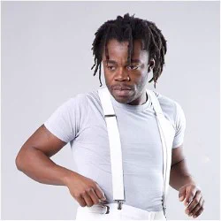 A Black man wearing a white t-shirt