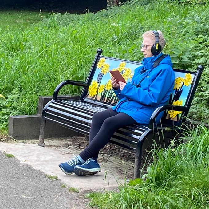 Soundwalk attendee sat on a bench