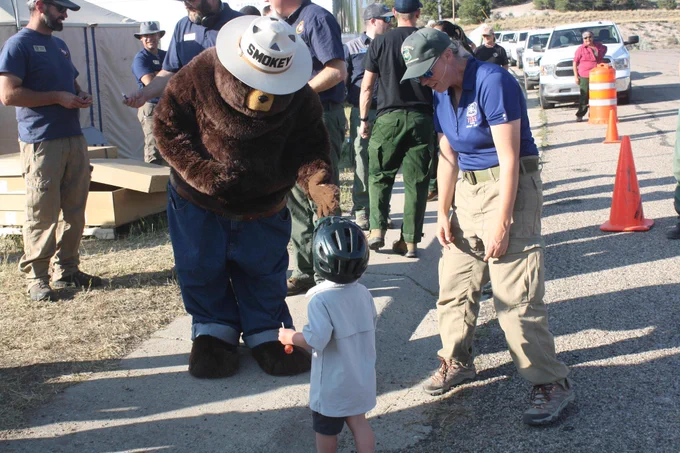 Pioneer Day kids parade with special guest Smokey Bear on the #SpeirsFire. Photo from InciWeb.