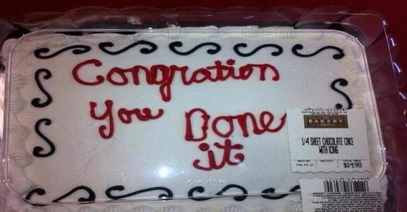 A silly old meme: a photo of a cake, decorated with the words “Congration You Done It”