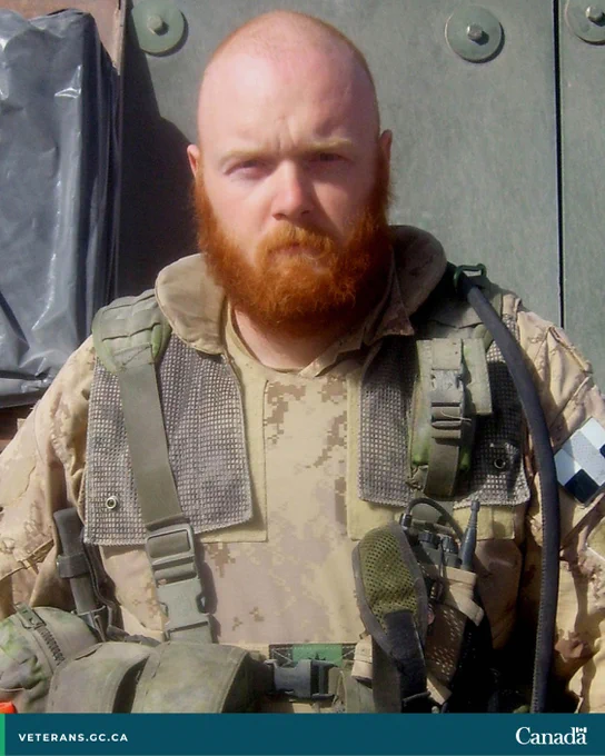 Master Corporal Erin Doyle wears military gear in Afghanistan.