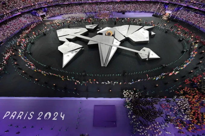 World map in centre of Stade de France for Olympics closing ceremony, with New Zealand missing.