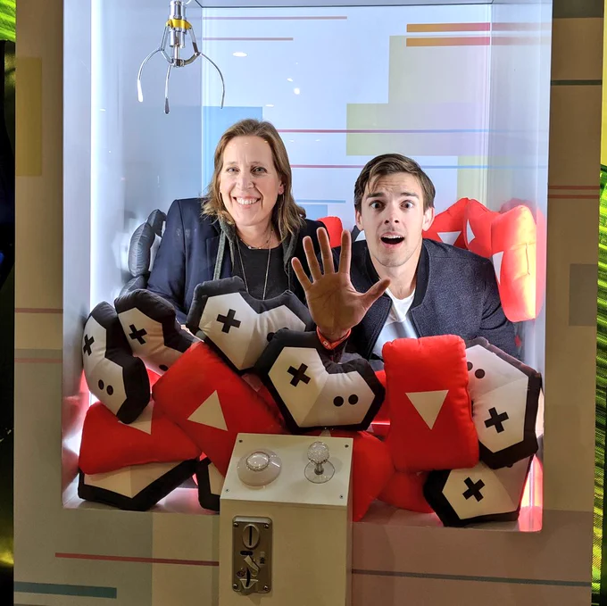 Susan Wojcicki and MatPat trapped in a claw machine game together