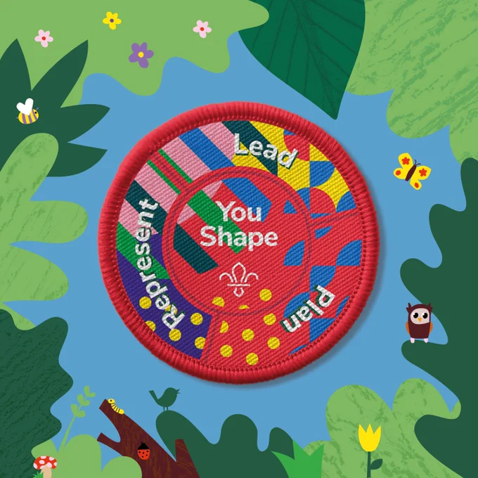 YouShape badge with the text "Lead," "Represent," "You Shape" on an illustrated backdrop of green leaves and small flowers. 