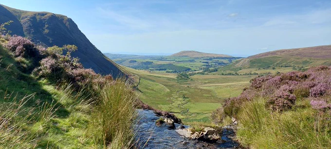 View from the Cumbrian Way approaching Bassenthwaite, from edge of waterfall looking over valley.