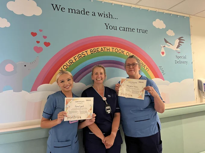 Kera Lynch and Margaret Nunn being presented by SCM Connie Milne