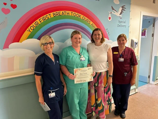 Bailie Cursiter being presented by the members of the Labour Ward team