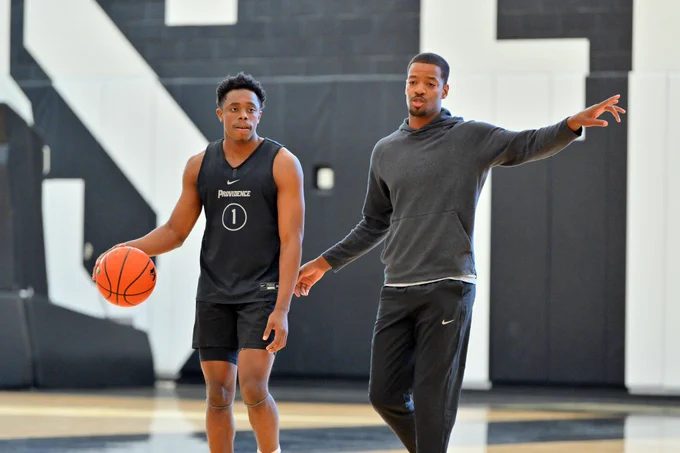 Jayden Pierre with the ball at practice with Kim English