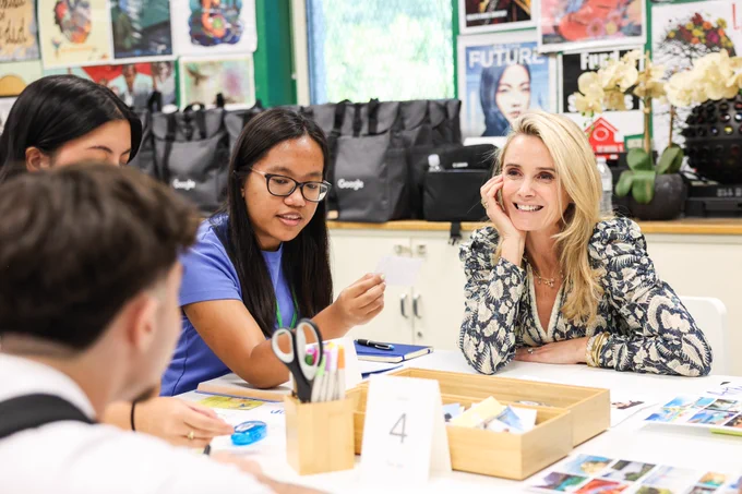 Photograph of First Partner Jennifer Siebel Newsom sitting with three high school students at a table in a classroom in a Los Angeles-area school. Photo taken at an event announcing the Google Mental Health Initiative – a collaboration with Selena Gomez's The Rare Impact Fund, DonorsChoose, The JED Foundation, Child Mind Institute and The Steve Fund – and a part of Google's Digital Wellbeing Fund.