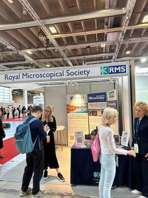 Attendees at emc2024 chat to RMS staff at the RMS exhibition stand.