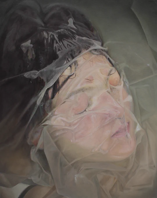 A painting of the artist's face underwater in a bathtub with a thin veil covering her face.