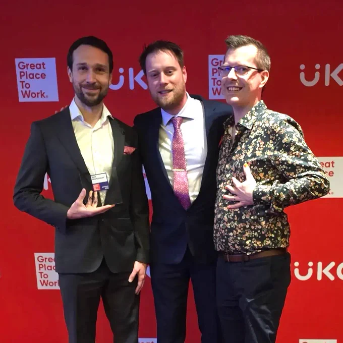 CEO Matt Davies, CTO Rob Moore, and Principal Engineer Stafford Williams with the award