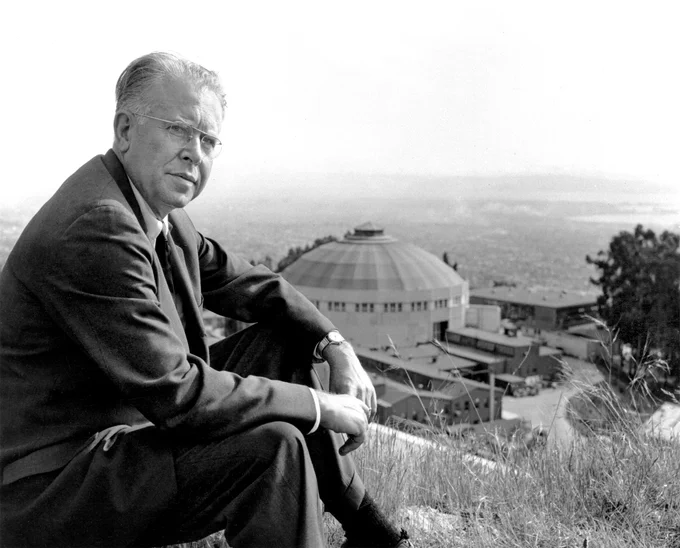Professor Ernest Orlando Lawrence looking over the then-called Lawrence Radiation Laboratory (LRL) with the 184-inch cyclotron in the background. 