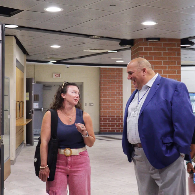 Asst. Superintendent Michael Caira chats with a staff member on Opening Day