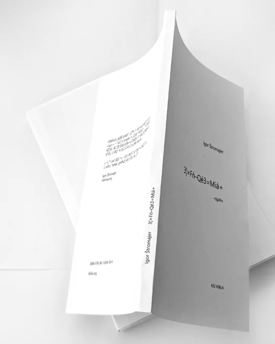 A printed draft of a white book with black letters on a white table.: Igor Štromajer 3¦×Fń–Qé3=Miá  -oµ4×