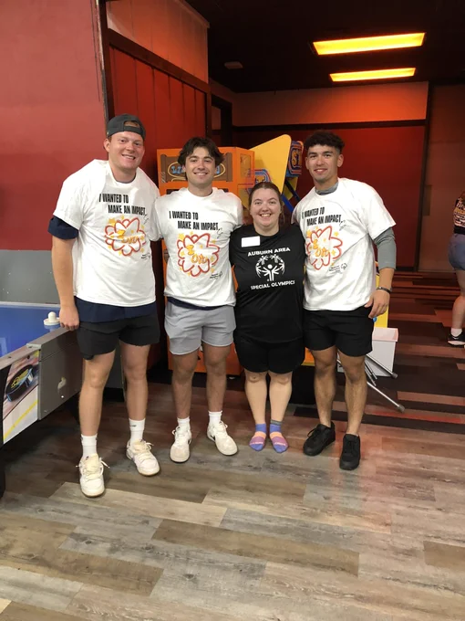 Baseball players with Special Olympic athlete