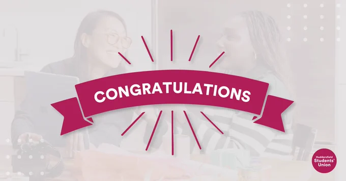 Two people sitting at a table, smiling and engaging in conversation with a 'CONGRATULATIONS' banner overlaid. The setting includes elements of a festive gathering, and the logo of the 'Federated Students' Union' is visible in the background.
