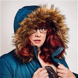 A woman in a parka jacket