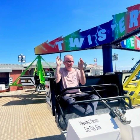 Hands in the air, enjoying the 'Twister' ride at Mablethorpe.