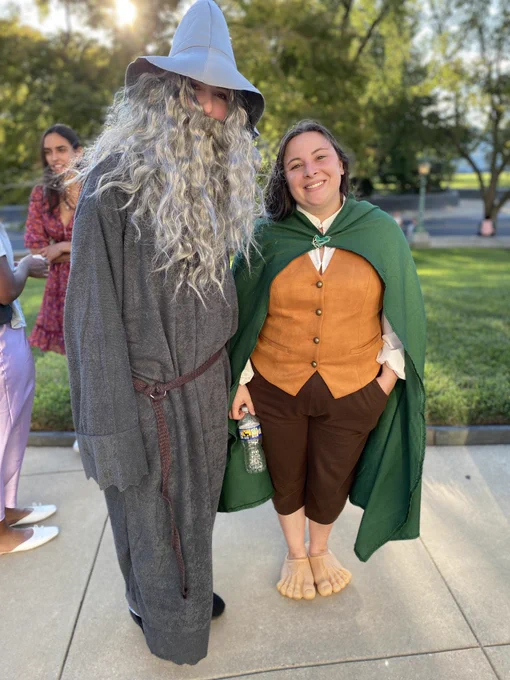 2023 Live! at the Library costume ball attendees dressed as Gandalf and a Hobbit