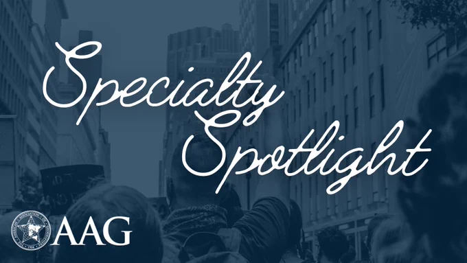 Banner reading "Specialty Spotlight" with elegant script over a blurred background of a bustling city street, featuring pedestrians and buildings. The AAAG logo is visible at the bottom right.