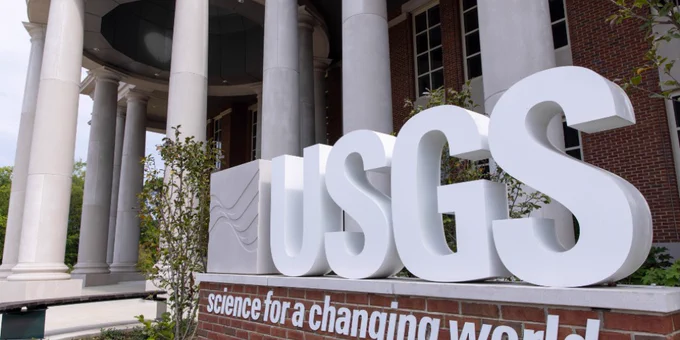 Photo of the front of the building with a USGS logo. Credit: University of Alabama. 