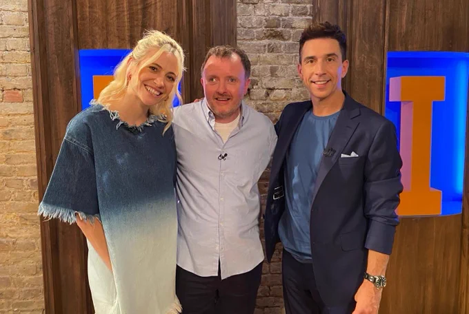 Chris McCausland stood in between Pixie Lott and Russel Kane