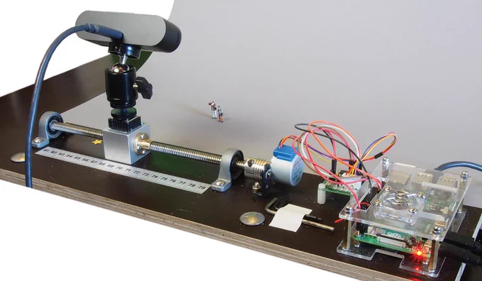 The Logitech Brio on a linear guide. The Raspberry Pi controls the motor.