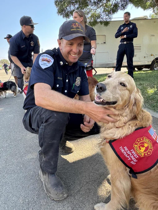 First Responder therapy dog visits fire camp on 8-8-24. Photo by Lassen National Forest.