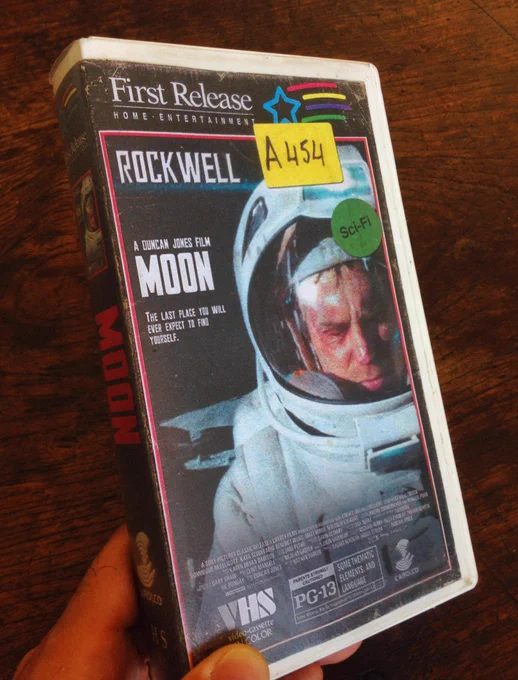 A VHS tape case for the 2009 film MOON featuring a man on the surface on the Moon wearing a spacesuit (well you have to really).