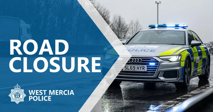road closure text with police car
