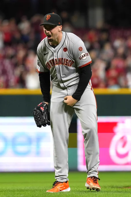 Blake Snell celebrates after the final out of his no-hitter. He is wearing a gray Giants jersey.