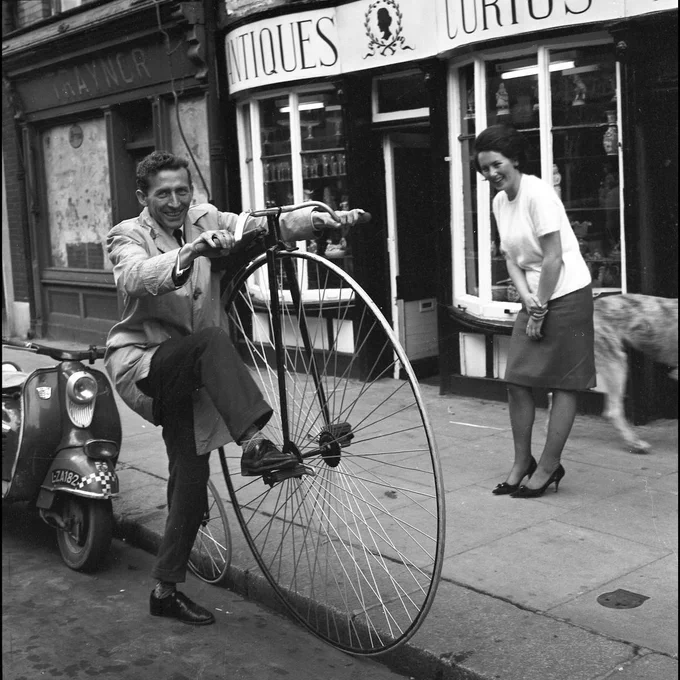 Man on a Penny Farthing bicycle 