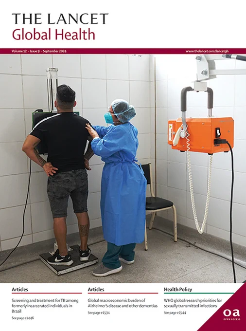 The cover of the September issue of The Lancet Global Health, featuring a health worker in personal protective equipment assisting a patient during a chest Xray. Photo credit: PAHO.