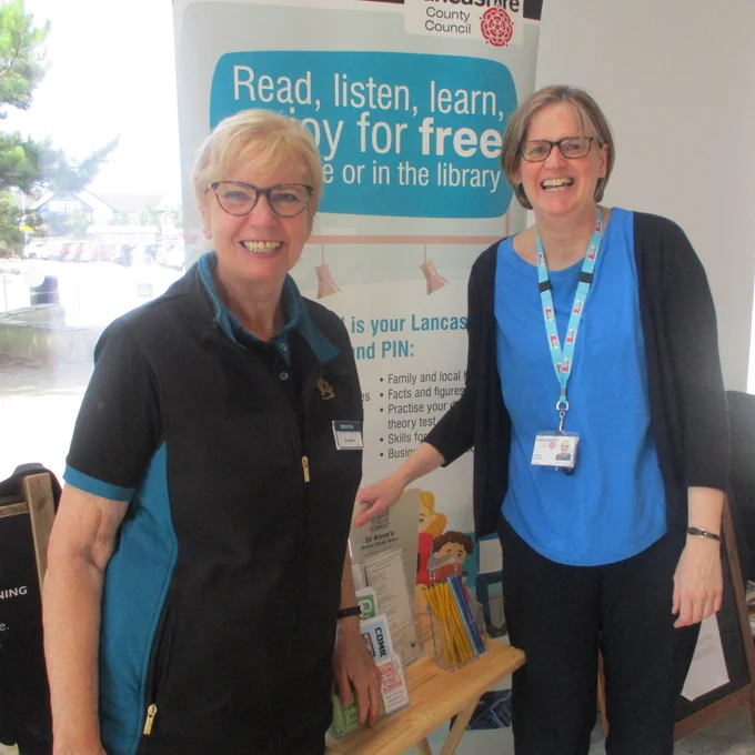 member of library staff with member of supermarket staff