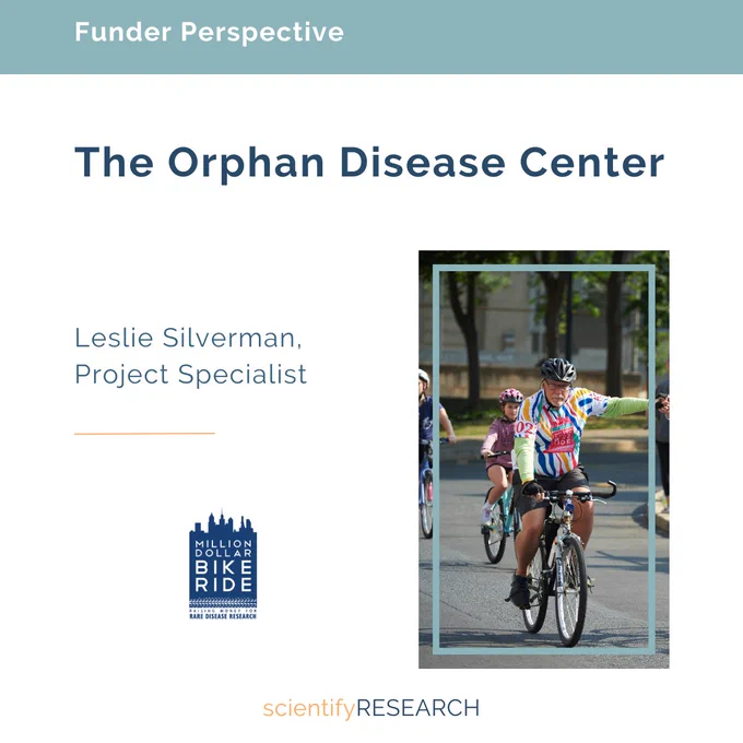 Funder Perspective
The Orphan Disease Center
Leslie Silverman, Project Specialist
Million Dollar Bike Ride

An image of a man in a striped shirt and helmet on a bicycle, holding hands with another biker. They appear to be in a group of people biking in the Million Dollar Bike Ride. 