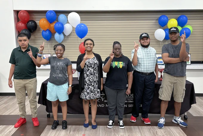 Performance-Based Learning in Unique School Settings (18 PLUSS) students sign up for internships in the Arlington ISD Food and Nutrition Services department.