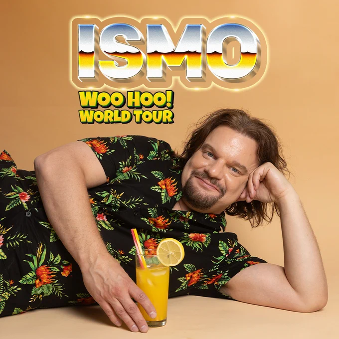 Man in a Hawaiian style shirt relaxing on his side holding an iced orange drink. Text reads ISMO WOO HOO! WORLD TOUR