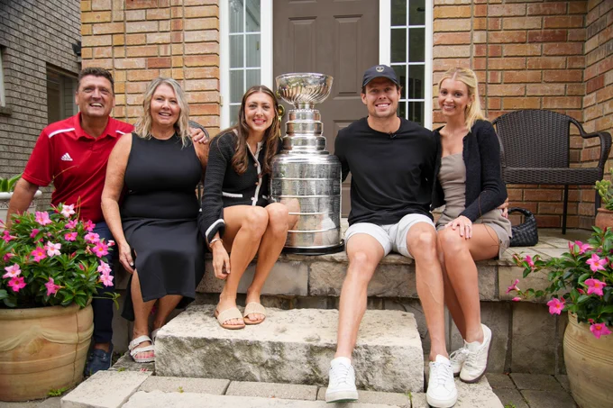 Carter Verhaeghe and his family pose with the Stanley Cup.